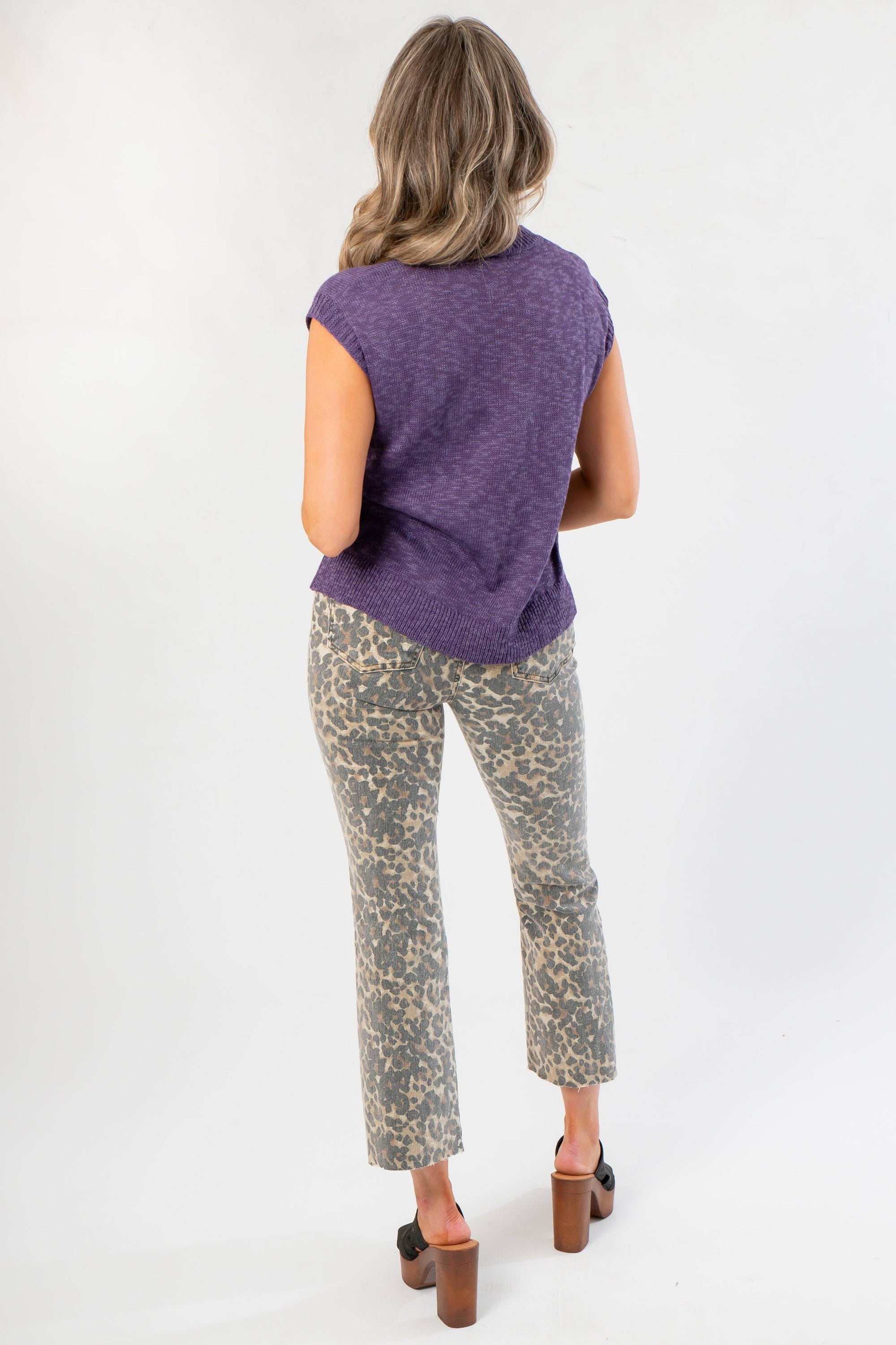 Back view of Tiffany Sleeveless Purple Ribbed Knit Top highlighting lightweight knit texture and loose fit for pre-fall styling.