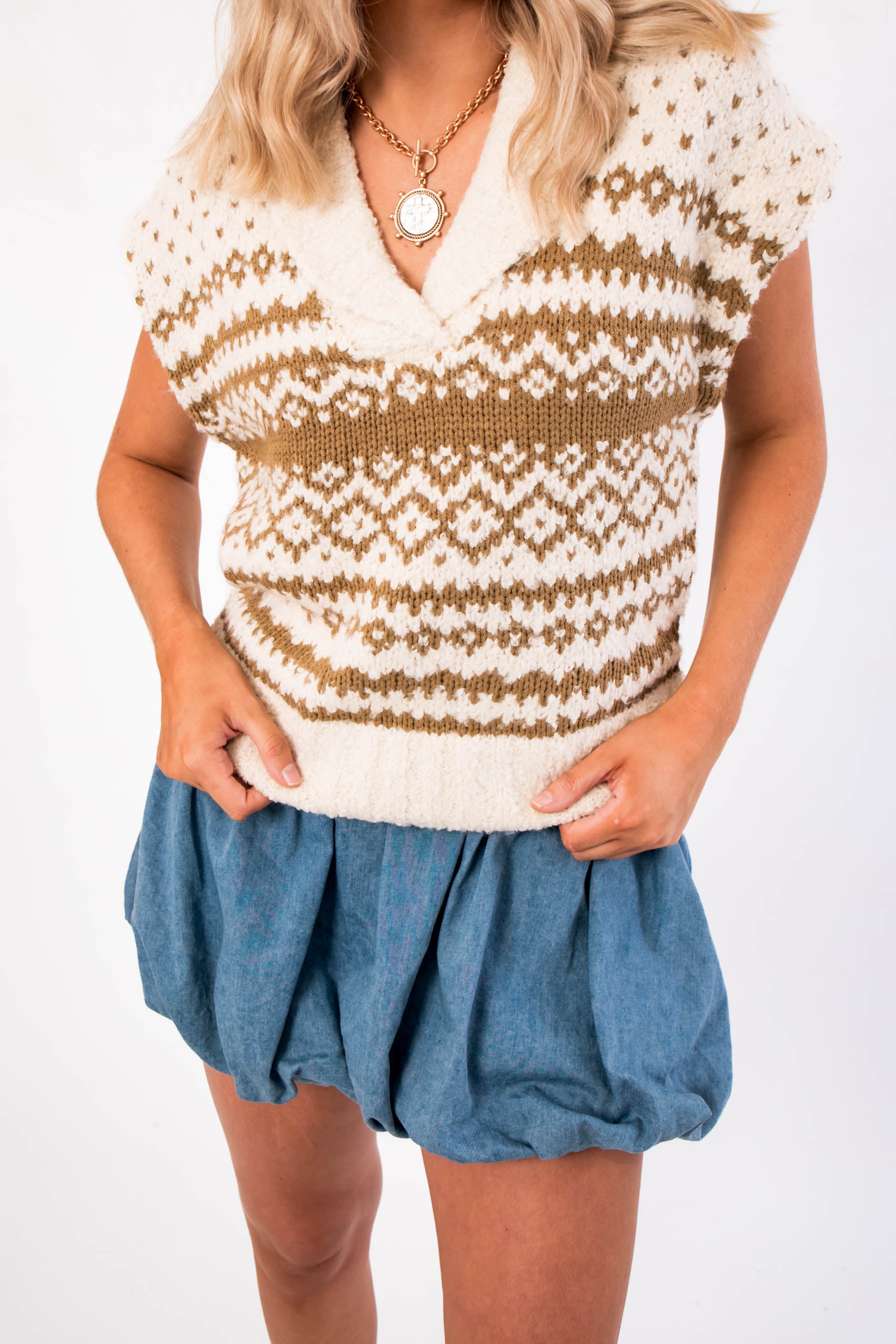 Steve Madden Multi Paulie Sweater Vest in cream and tan Fair Isle knit, styled with a blue bubble skirt for trendy women’s layering.