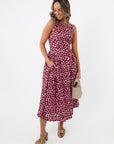 THML Tini Pink Polka Dot Midi Dress – Stylish Summer Dress with sleeveless design, fitted bodice, and flared skirt, ideal for warm-weather events.