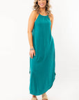 Sunny Teal Halter Midi Dress with flowy silhouette and flattering neckline, ideal for beach days and summer outings.
