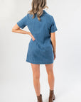 Back view of Z Supply Medium Indigo Denim Mini Dress highlighting its clean, simple design and above-the-knee length. Great for versatile styling.