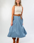 Polly Cream Knit Sleeveless Top styled with a chambray midi skirt and brown belt, ideal fall layering tank for casual chic outfits.