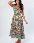 Floral Midi Dress - Brown Sleeveless with square neckline, adjustable straps, and green floral hem, styled for fall casual wear.