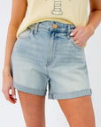 Kut from the Kloth Wonder Taylor High Rise Short in light wash denim with cuffed hem and 5-pocket styling, perfect for summer wear.