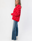 Side view of Ho Ho Ho-liday Cheer Red Christmas Sweater showing relaxed fit and festive knit design, perfect for holiday events.