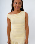 Bodycon mesh dress with flattering ruching in soft yellow color