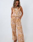 Cream and tan matching coastal set with scallop seashell pattern for beach coverup and tropical vacation look