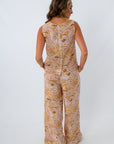 Yellow and orange seashell print pants with matching tank for a matching coastal set for vacation, summer, dinner outfit