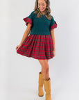 Mistletoe Moment Tartan Plaid Babydoll Dress with green top and red plaid skirt, perfect comfy Christmas dress for holiday parties.