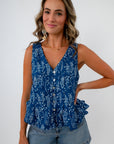 Blue and white fish print button front top