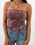 Strapless mauve beaded tube top with floral and geometric embellishments for summer fashion