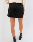 Back view of Z Supply Black Ciera Suede Mini Skirt highlighting smooth suede finish and tailored fit for chic winter looks.