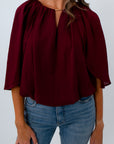 Elegant burgundy shirt for fall work wear with cape sleeves