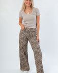 Fitted Z Supply Heather Taupe Sirena Short Sleeve Rib Tee paired with wide-leg leopard pants, showcasing a cozy everyday outfit.