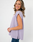 Side view of Camila Lavender Knit Top showing relaxed fit and side slit detail, perfect for casual spring outfits.