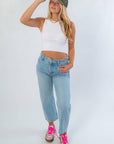 Off White Knit Tank Top – Stylish All-Season Crop Top styled with high-rise jeans and sneakers, perfect for layering or wearing solo.