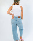 Back view of Off White Knit Tank Top – Stylish All-Season Crop Top featuring racerback design and snug fit, ideal for versatile everyday wear.