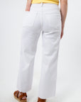 Back view of Kut from the Kloth Optic White Meg High Rise Wide Jean featuring clean pockets and cropped wide leg. A versatile wardrobe staple.