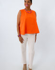 Clemson game day outfits for women featuring an orange denim top with white pants
