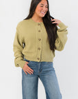 Free People Whispering Willow Lila Cardigan in textured knit with button front, shown in relaxed fit for fall layering.
