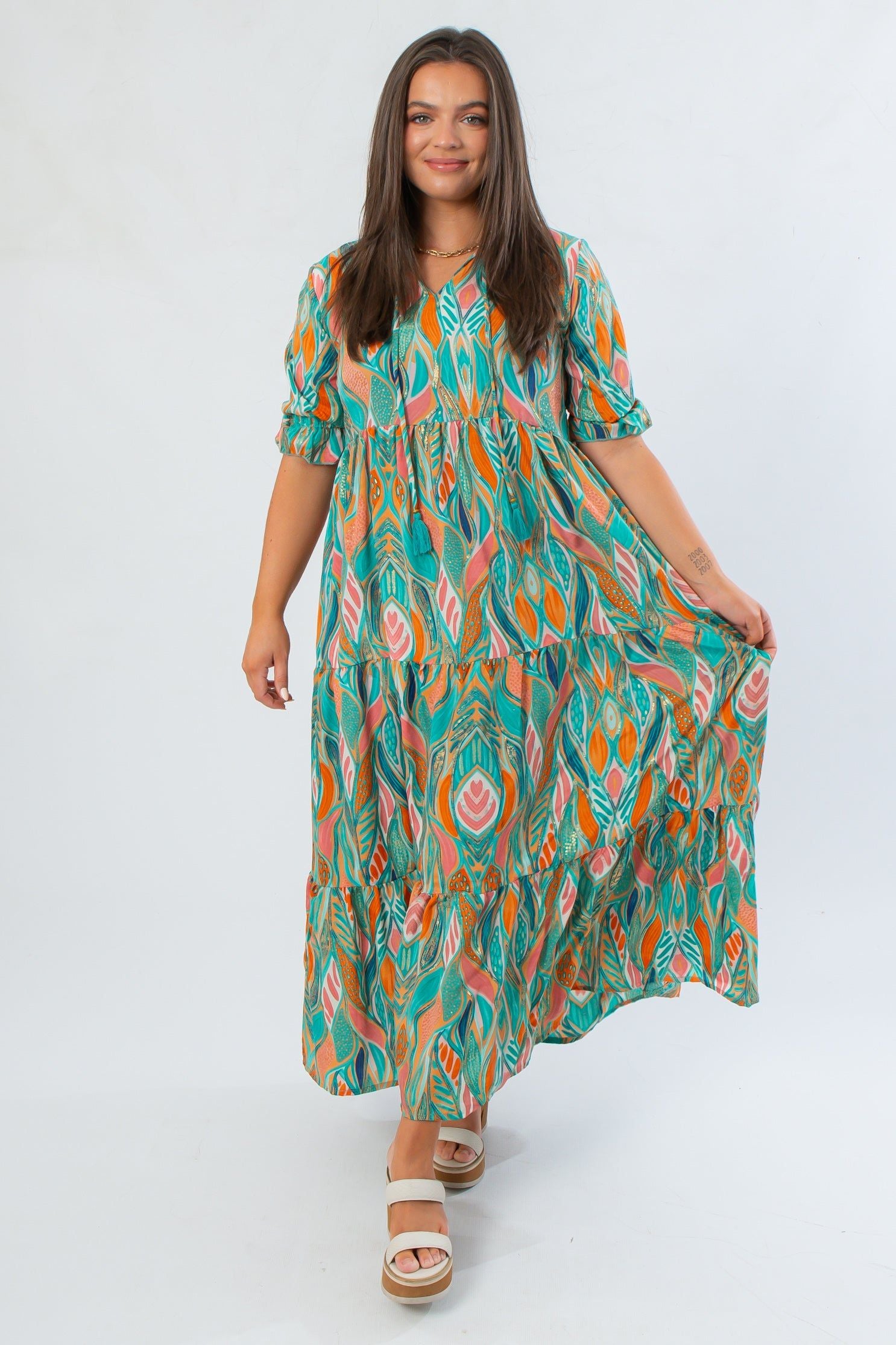 Sea Foam Green Mahi Maxi Dress with v neckline, ruffle collar, and colorful leaf pattern, perfect for weddings or casual summer events.