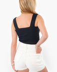 Back view of Off White High Rise Utility Cargo Shorts highlighting patch pockets and a flattering fit. A must-have for summer wardrobes.