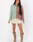 Cozy oversized Road Ahead Mint & Brown Colorblock Sweater paired with beige skirt and tan boots, ideal for fall layering.
