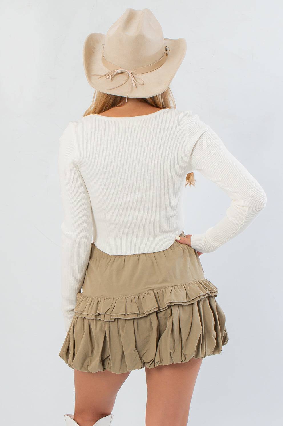 Back view of Before You Go Cream Long Sleeve Crop Top – Chic & Comfortable showing ribbed texture and cropped fit, ideal for layering with skirts or jeans.