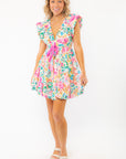 Full front view of Meet Me in Santorini Aegean Garden Dress featuring bright floral design, flared skirt, and flattering silhouette.