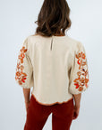 Fall blouse with keyhole button and stitching detail, THML blouse with puff sleeves, cream THML blouse with floral embroidery