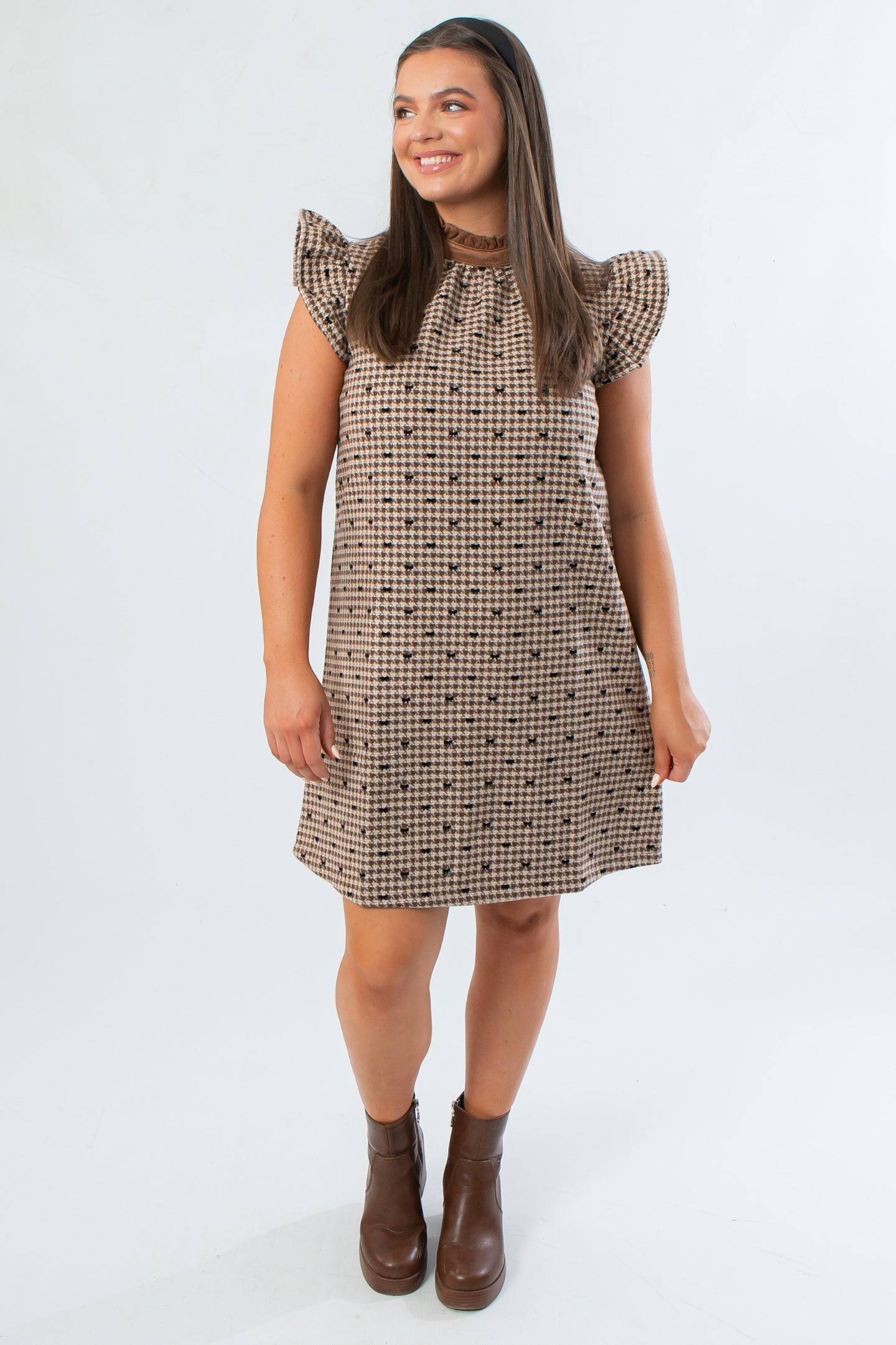 Sweet fall style Blair Bow Print Brown Tweed Dress featuring a relaxed fit, perfect for layering with boots for Thanksgiving or autumn outings.