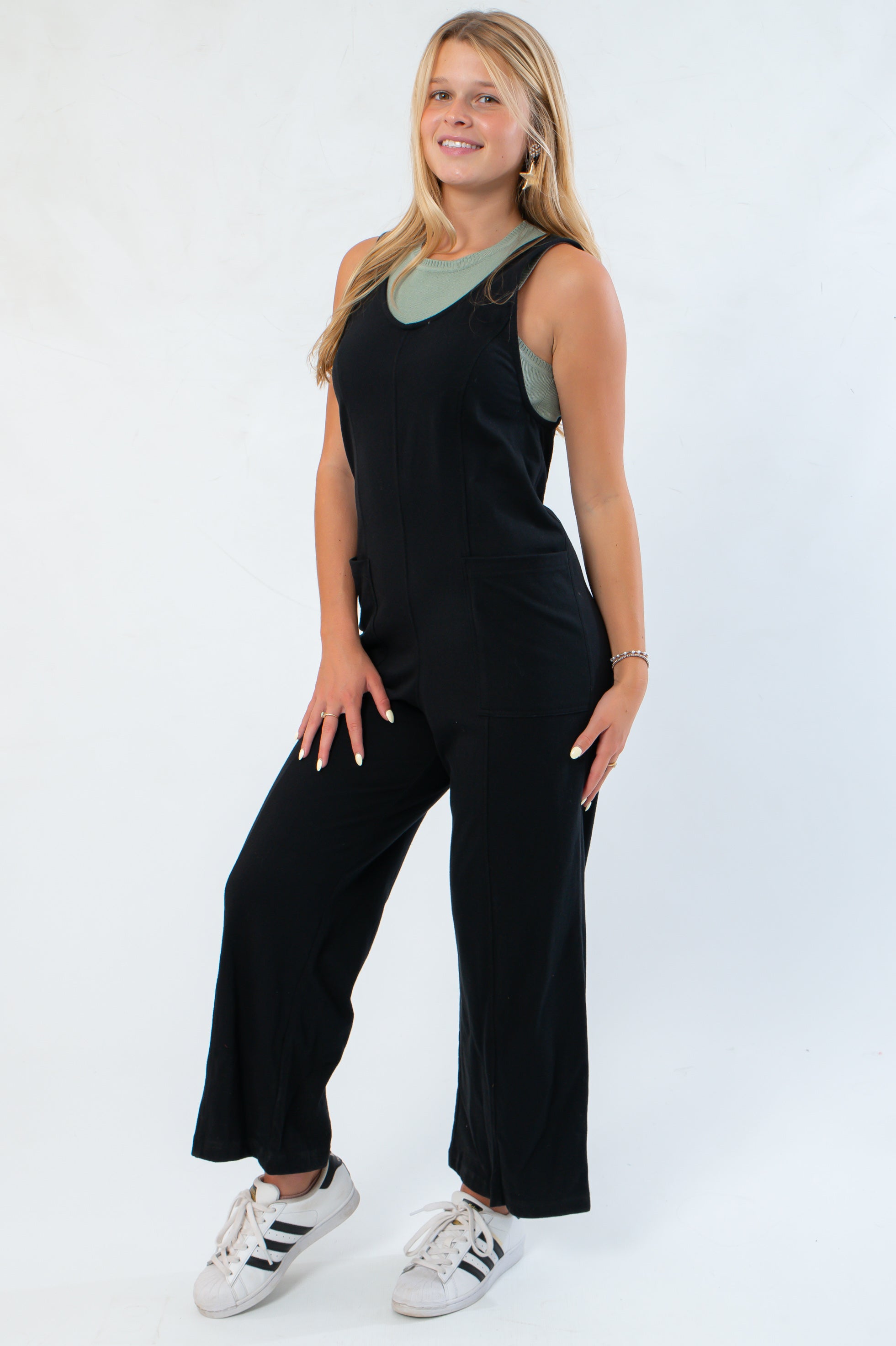 Side view of Z Supply True Black Everyday Jersey Jumpsuit showing soft jersey fabric, wide-leg cut, and flattering fit for all-day lounging.
