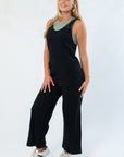 Side view of Z Supply True Black Everyday Jersey Jumpsuit showing soft jersey fabric, wide-leg cut, and flattering fit for all-day lounging.