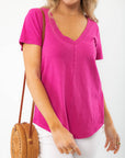 Close-up of Z Supply Magenta Asher V-Neck Tee, highlighting its curved hemline, soft fabric, and casual-chic appeal.