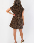 Back view of THML Brown Cheetah Print Suede Dress highlighting the A-line shift cut and bold cheetah pattern, ideal for trendy fall outfits.