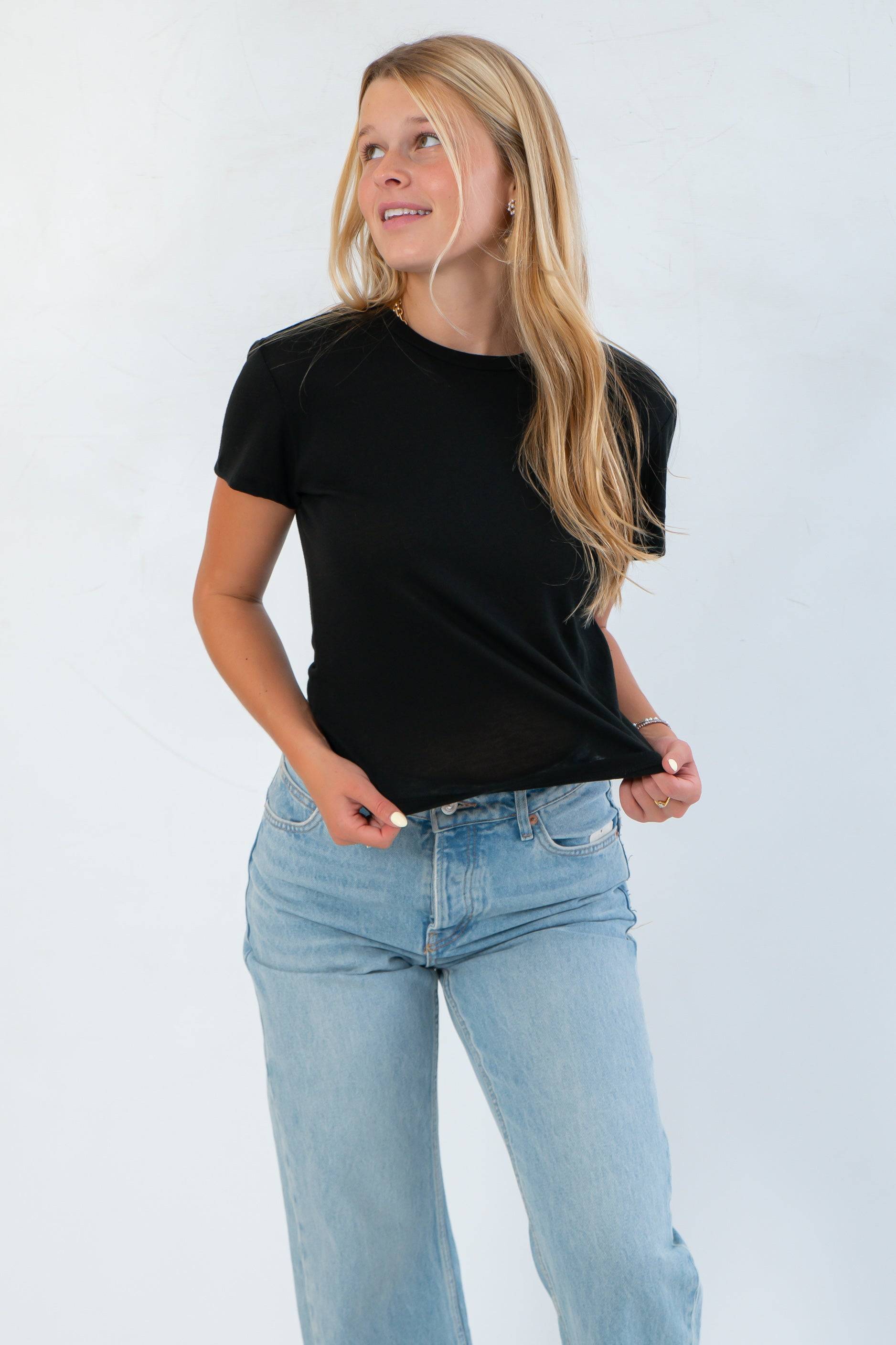 Z Supply Black Tourist Tee – Lightweight short sleeve cotton tee with crew neckline, paired with denim for a laid-back look.