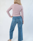 Back view of Carry On Pink & Brown Striped Button Front Top highlighting its snug fit and horizontal stripe pattern, styled with denim jeans.