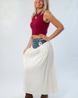 Side view of the Denim Voile Maxi Skirt by Show Me Your Mumu, highlighting the contrast denim waist and flowing cream fabric.