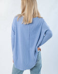 Back view of Free People Dawn Breeze Latte Blues Solid Thermal highlighting center seam detail and flowy silhouette for laidback layering style.