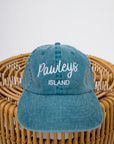 Sunwashed Pawleys Island embroidered baseball cap on wicker