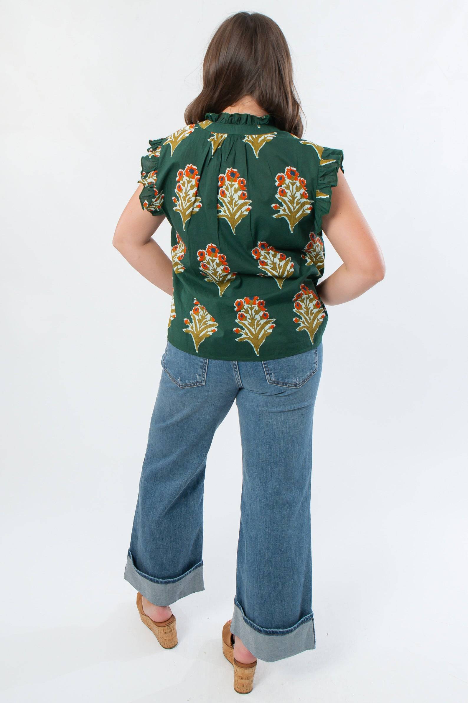 Back view of THML Dark Green Ruffle Sleeve Block Floral Print Blouse highlighting ruffle sleeve detail and block floral print for a chic fall look.