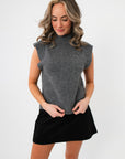 Close-up of Rowan Grey Mockneck Sweater Tank highlighting its soft knit texture, cap sleeves, and flattering mock neckline.
