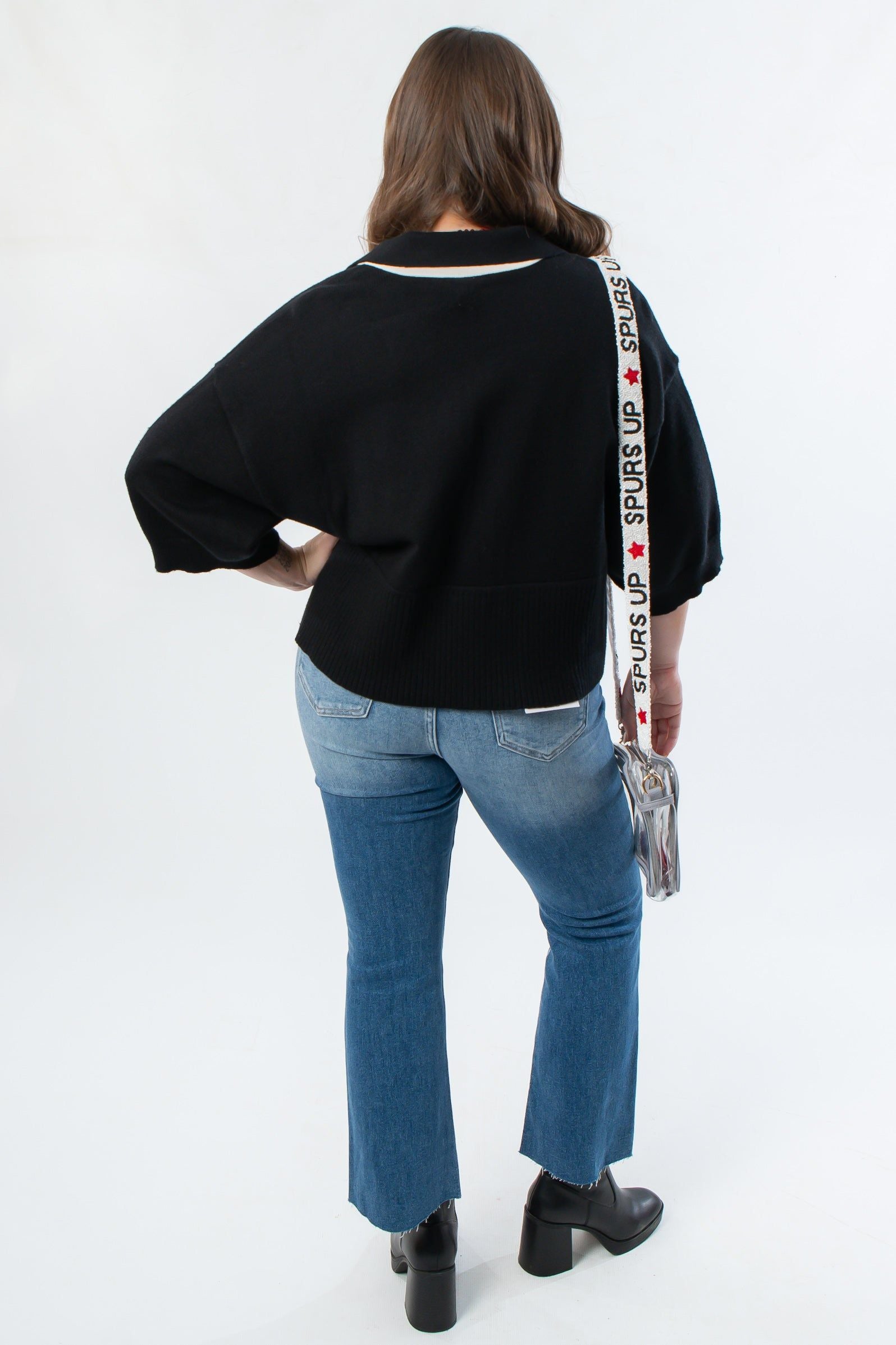 Back view of Angie Contrast Collared Crop Sweater in black, highlighting ribbed hem and oversized sleeves for a cozy fall outfit.