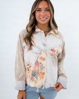 Lightwash jacket with corduroy striped patches and floral buttons. lightwash denim jacket, lightweight jacket with floral detail
