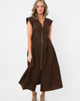 Brownstone Front Zip Sleeveless Midi Dress with V-neck and cinched waist, styled with leopard print heels for a chic fall look.