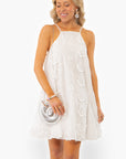 Antique Floral Halter Dress styled with silver clutch and statement earrings, perfect for graduation or bridal celebrations with vintage charm.
