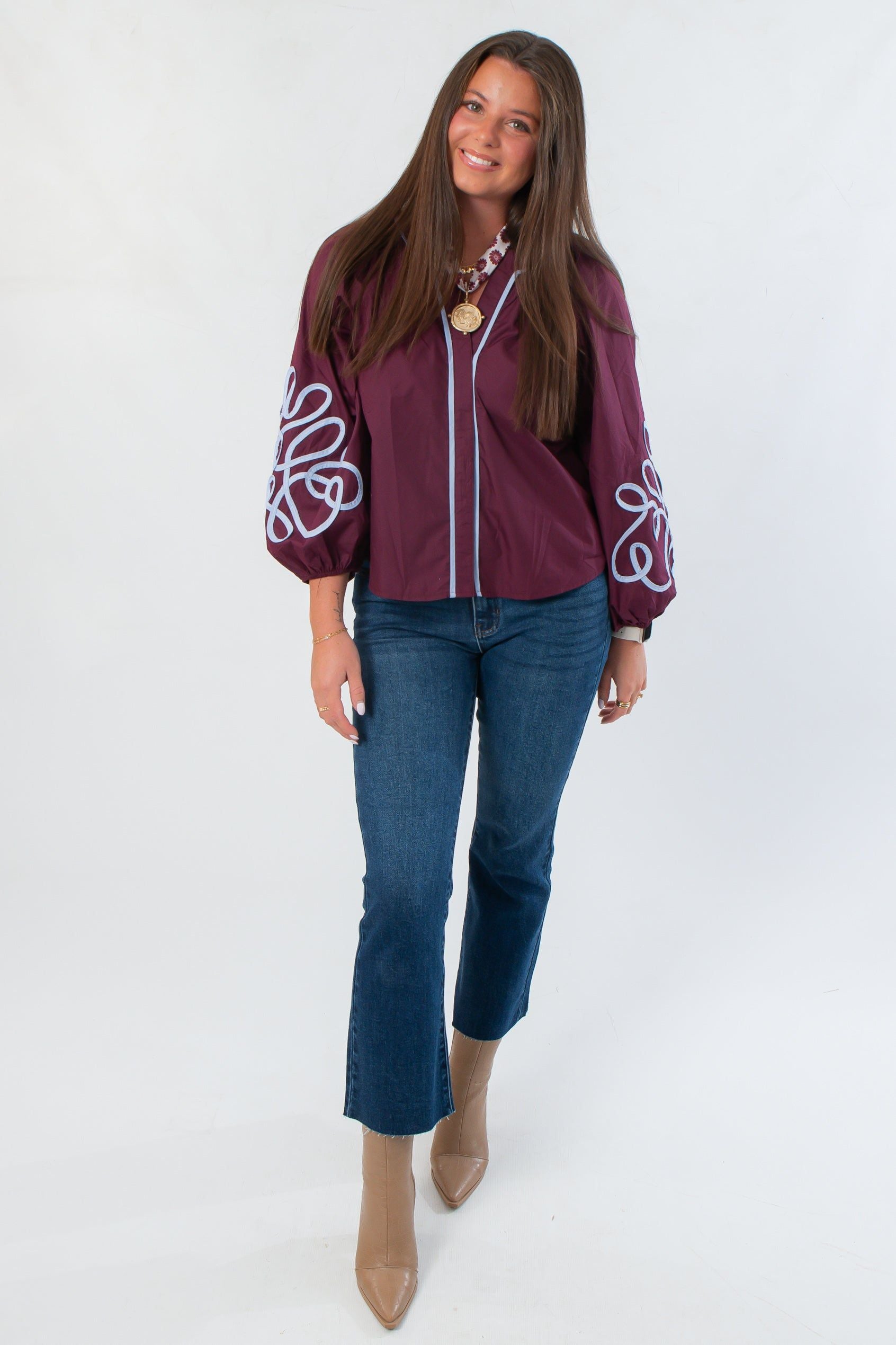 Elegant Wine Multi Long Sleeve Embroidered Blouse featuring contrast piping and voluminous sleeves, perfect for workwear or holiday styling.