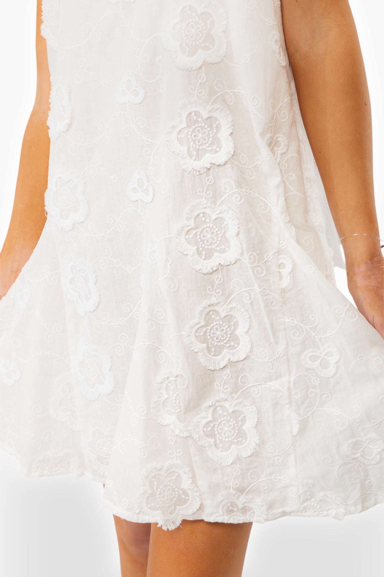 Close-up of Antique Floral Halter Dress fabric showing detailed white floral lace, highlighting its vintage-inspired texture and bridal elegance.
