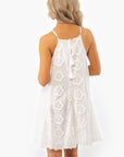 Back view of Antique Floral Halter Dress showing tie-back detail and floral lace pattern. A breezy choice for weddings or vacation wear.