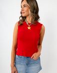 Red sleeveless knit top with open back and fitted style